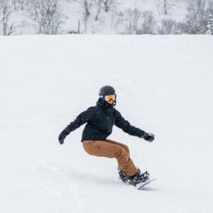 Ella on Capita Snowboard in Niseko